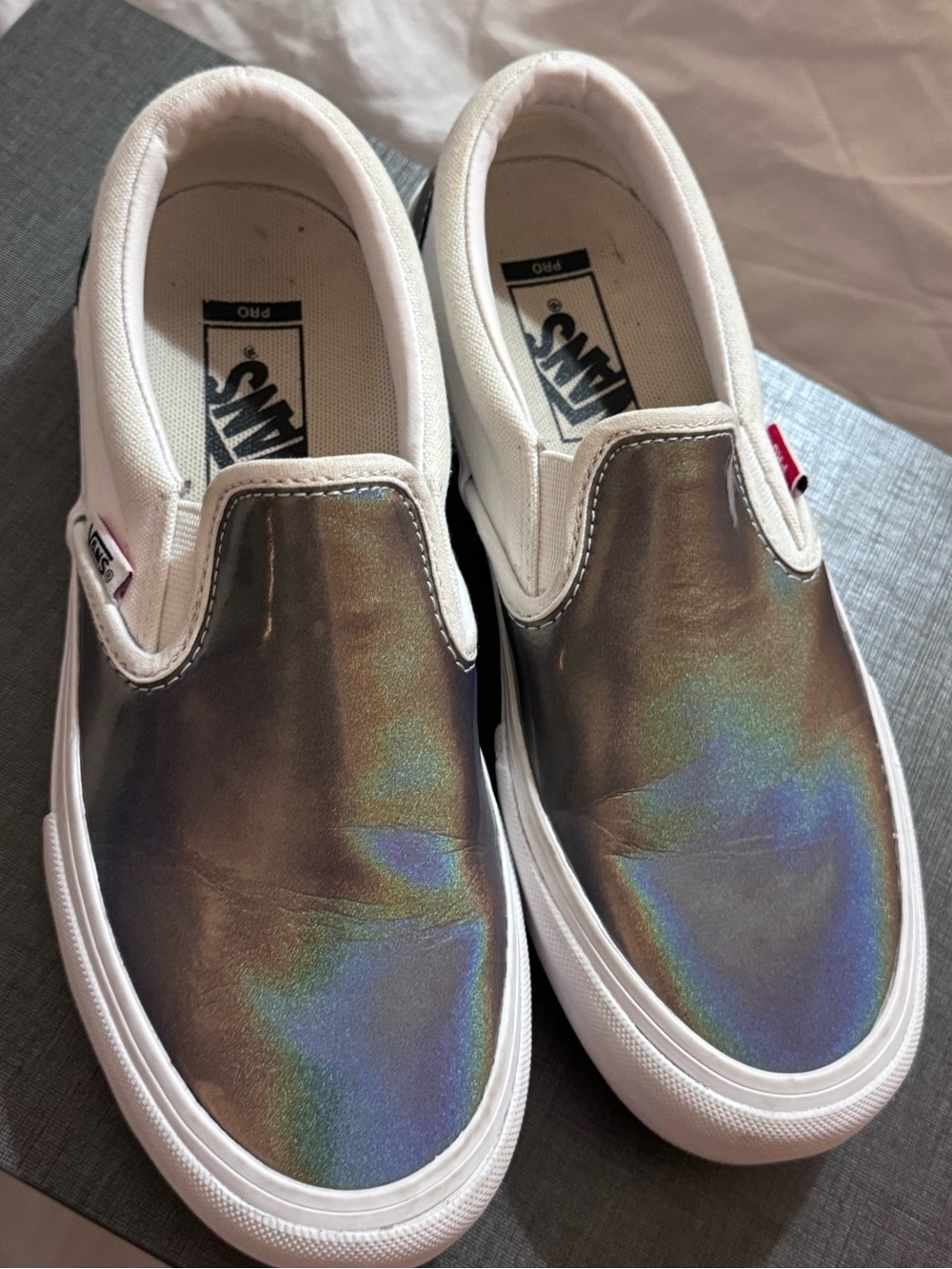 Vans unisex Iridescent Silver Slip-On Sneakers with White Trim Men 6 Women 7 1/2